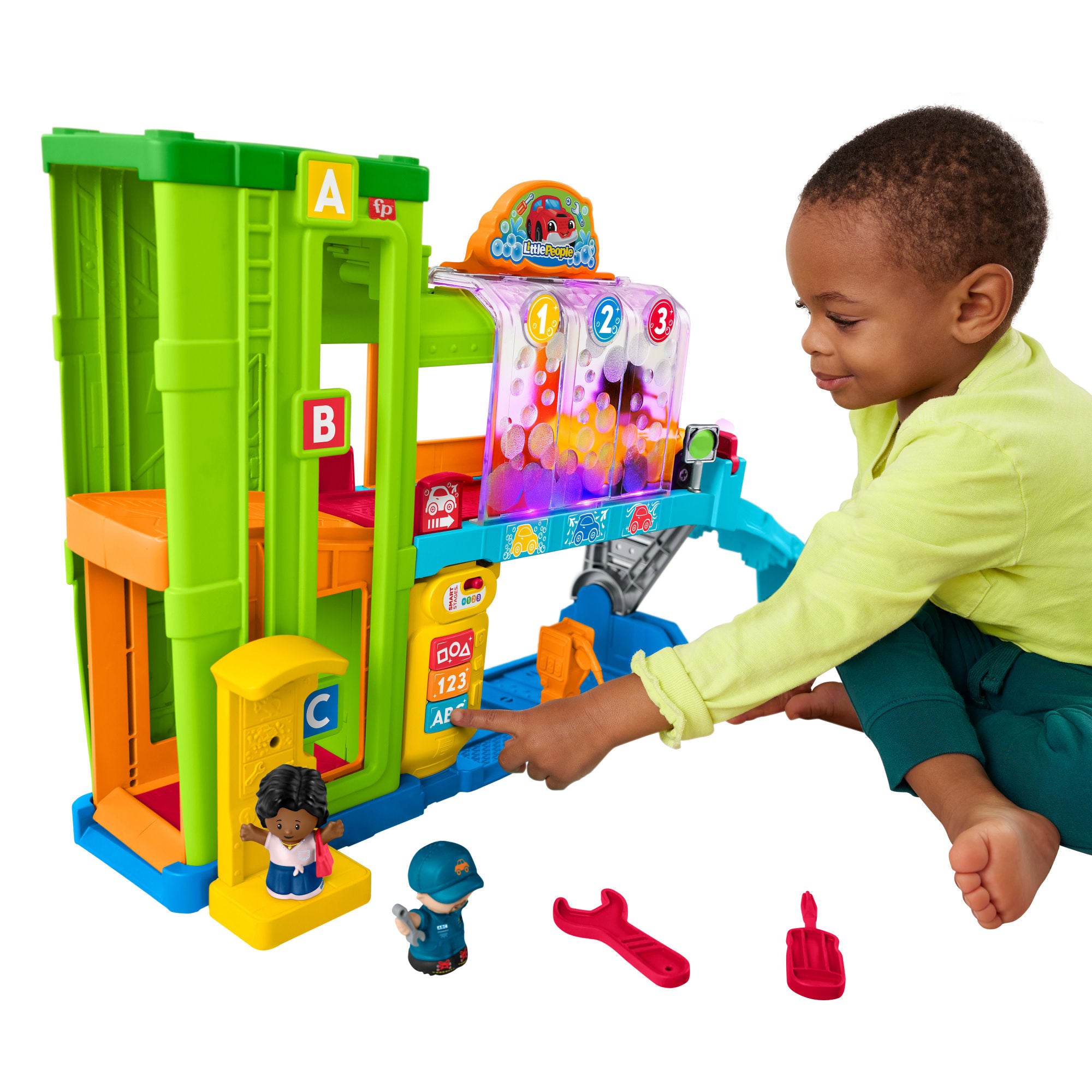Fisher-Price Little People Light-Up Learning Garage Toddler Playset. 5 Play Pieces. Multi-Language Version